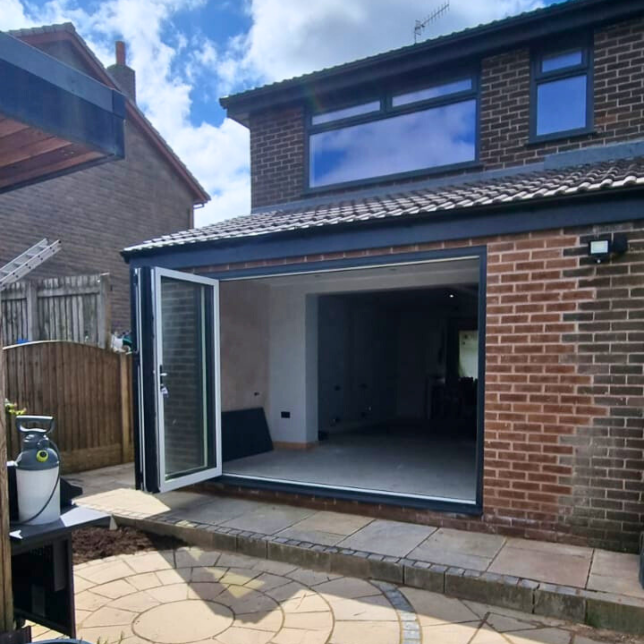 Finished home extension with bifold doors by Craig Kershaw Ltd